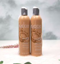 Load image into Gallery viewer, Two bottles of brown product