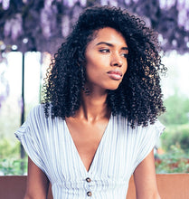 Load image into Gallery viewer, Close-up of a curly-haired woman 
